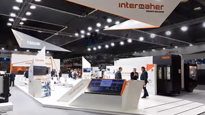 Diseño y montaje de stand ferial para exhibición de maquinaria pesada de Intermaher en BIEMH 2022